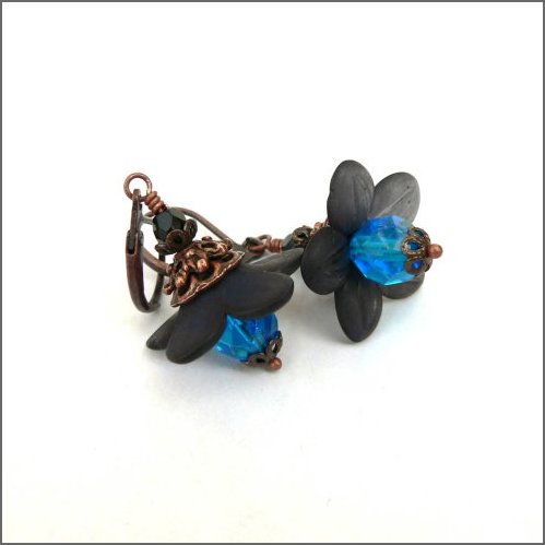 Cerulean and Ebony Luscious Flower Earrings. Beautifully sparkling cerulean blue beads adorned with ebony petals and ornamented with copper swaying under nickel free copper leverbacks