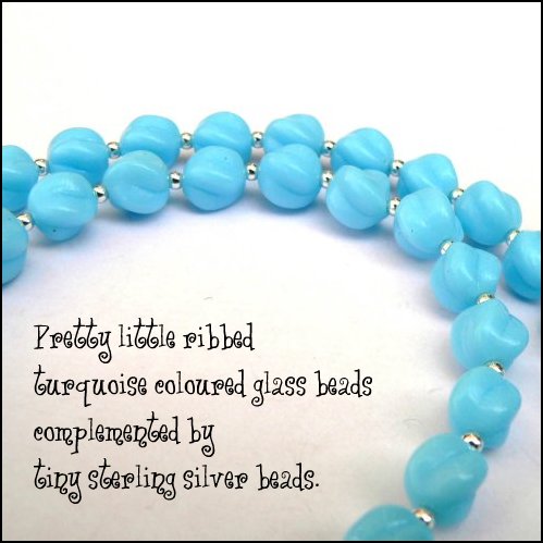 Necklace made from Pretty little ribbed turquoise coloured glass beads complemented by tiny sterling silver beads.